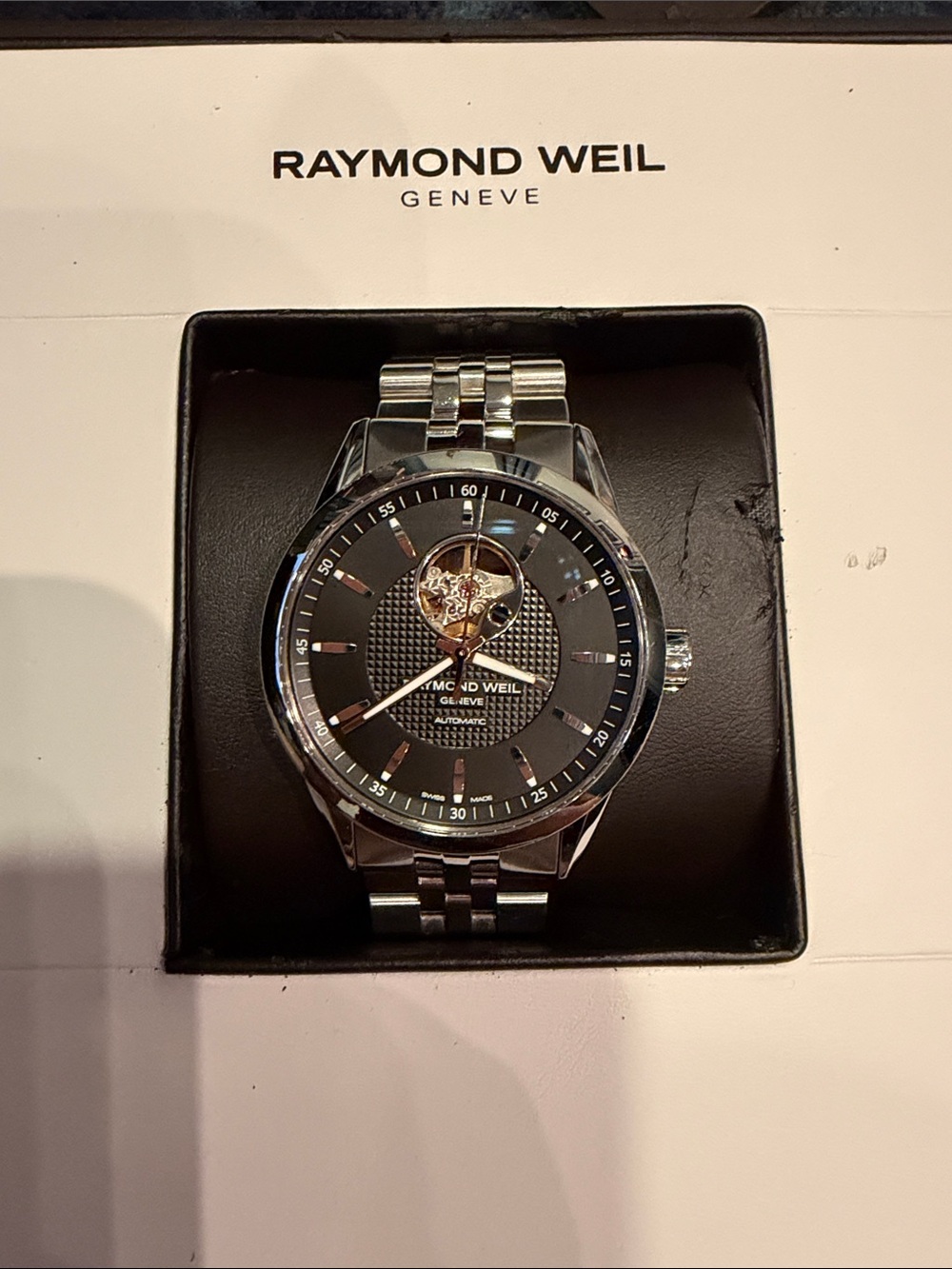 Raymond Weil Silver Stainless Steel Auto Watch with Black Dial and Open-Heart